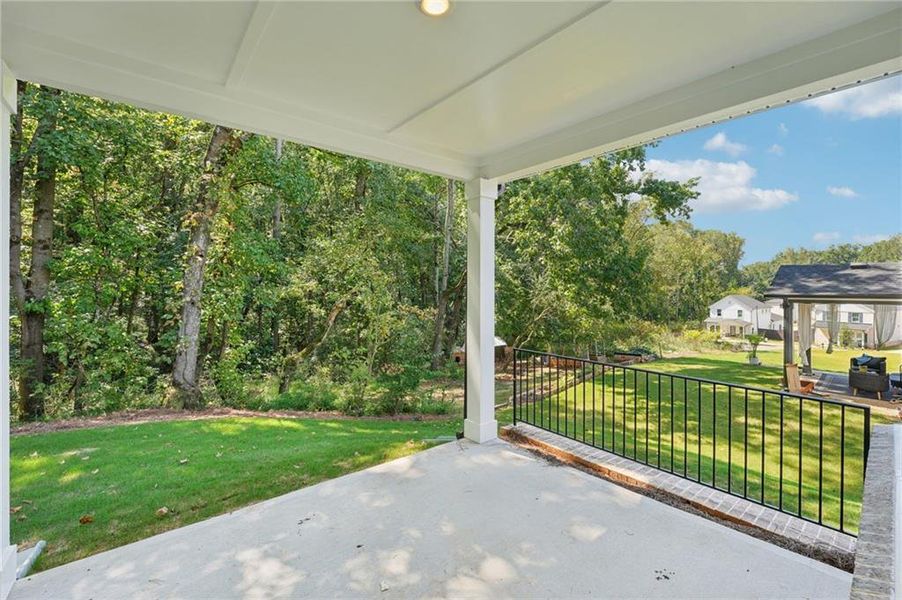 Exterior details and patio area of a home in Hemingway - Reserve Series, Cumming (Image 2). Exterior details and patio area of a home in Hemingway - Reserve Series, Cumming (Image 2).