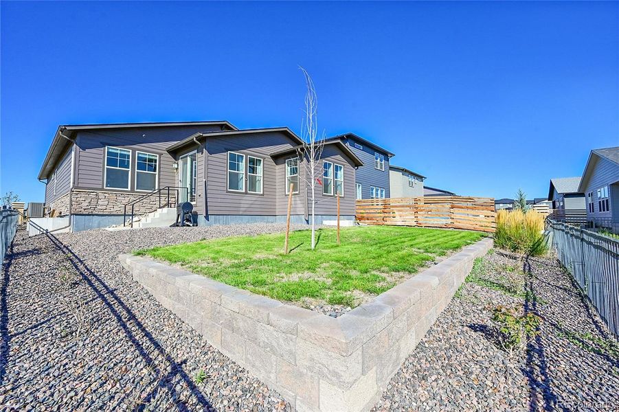Exterior details and patio area of a home in , Aurora (Image 1).