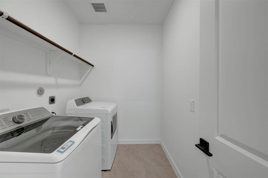 Laundry room (*Photo not of actual home and used for illustration purposes only.)