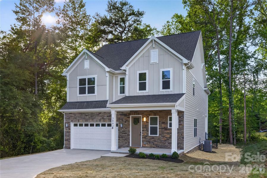 Front exterior of a new home in , Hickory, NC, highlighting curb appeal (Image 25).