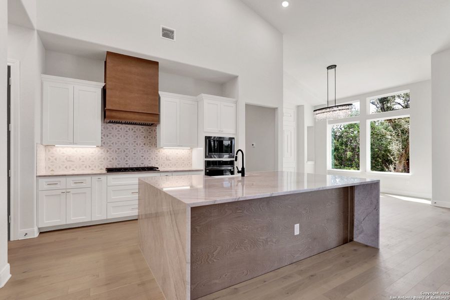 Furnished interior view inside a new home in , Bulverde (Image 11).