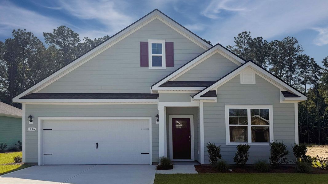Front exterior of a new home in Hemingway Landing, Conway, SC, highlighting curb appeal (Image 1). Front exterior of a new home in Hemingway Landing, Conway, SC, highlighting curb appeal (Image 1).