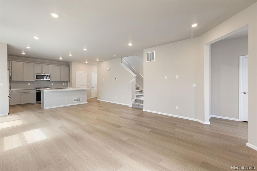 Spacious, unfurnished interior of a new home in Woodrose at Painted Prairie, Aurora (Image 17).