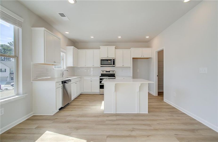Furnished interior view inside a new home in Cedar Grove Commons, Conley (Image 4). Furnished interior view inside a new home in Cedar Grove Commons, Conley (Image 4).