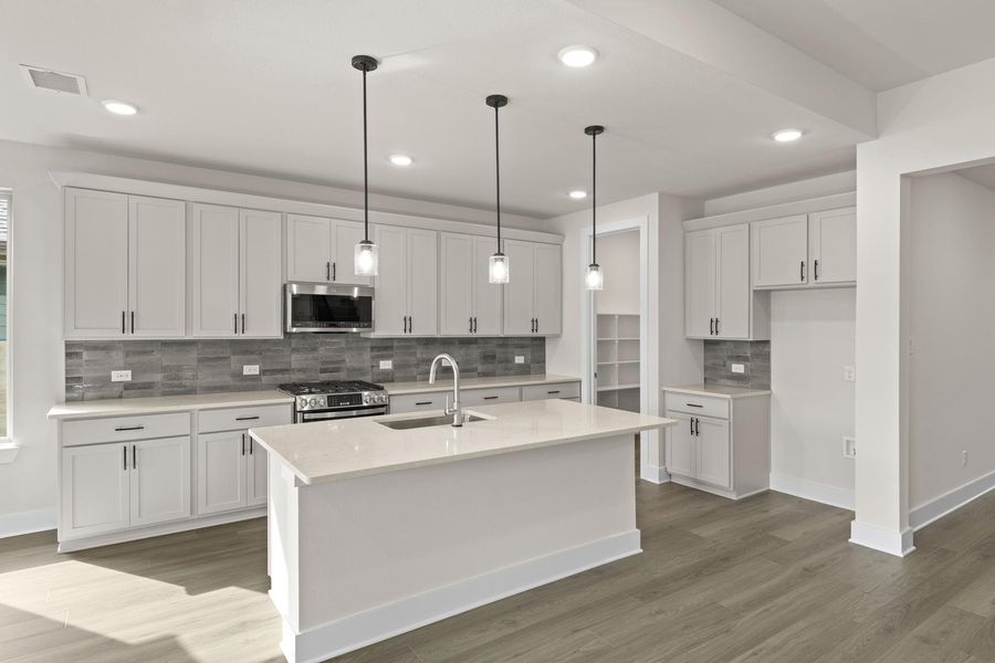 Furnished interior view inside a new home in Discovery Collection at Painted Tree Village, McKinney (Image 6). Furnished interior view inside a new home in Discovery Collection at Painted Tree Village, McKinney (Image 6).