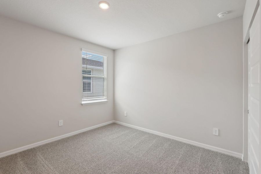 Spacious, unfurnished interior of a new home in Hampton Park - Classic Series, Vero Beach (Image 22).