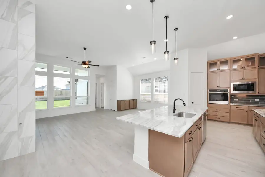 Furnished interior view inside a new home in Beacon Point, Texas City (Image 6).