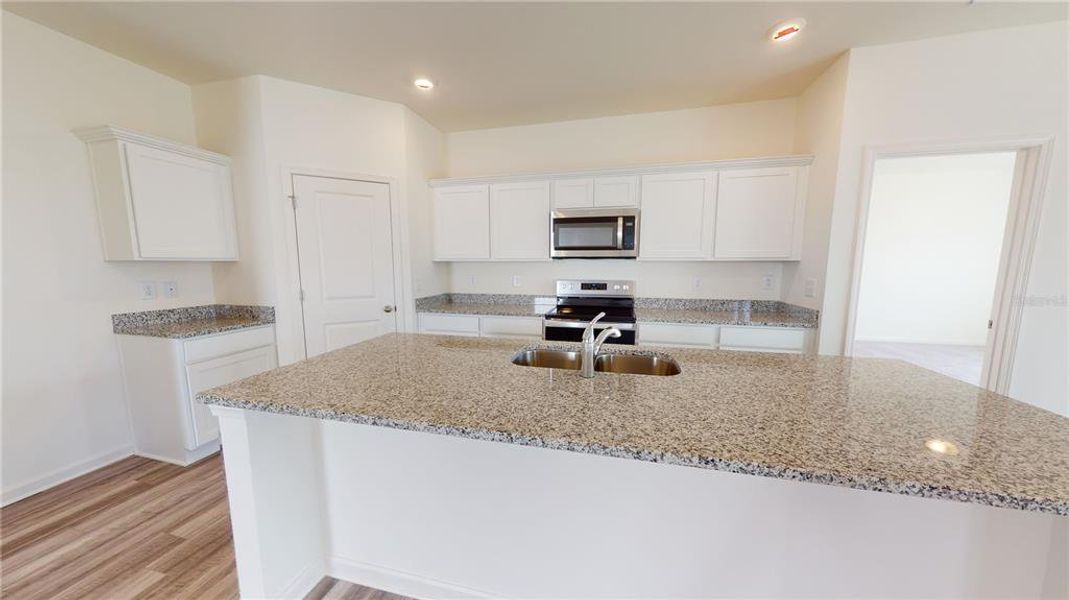 Furnished interior view inside a new home in Pinecone Reserve, Brooksville (Image 4).