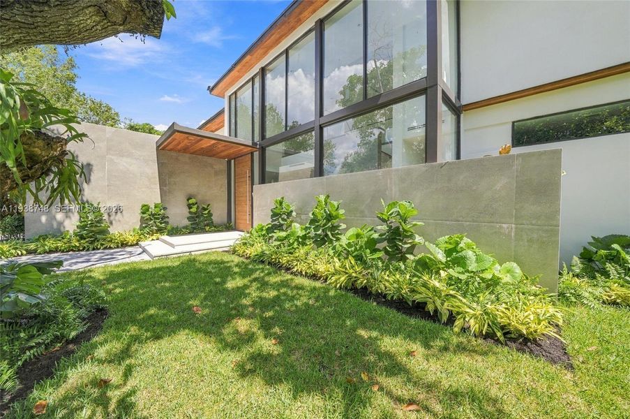 Exterior details and patio area of a home in , Miami (Image 16). Exterior details and patio area of a home in , Miami (Image 16).