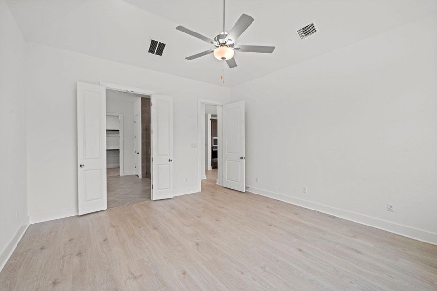 Primary Bedroom with elevated ceiling