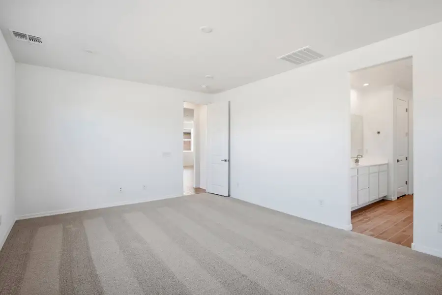 Spacious, unfurnished interior of a new home in Marbella at Windrose, Waddell (Image 42). Spacious, unfurnished interior of a new home in Marbella at Windrose, Waddell (Image 42).