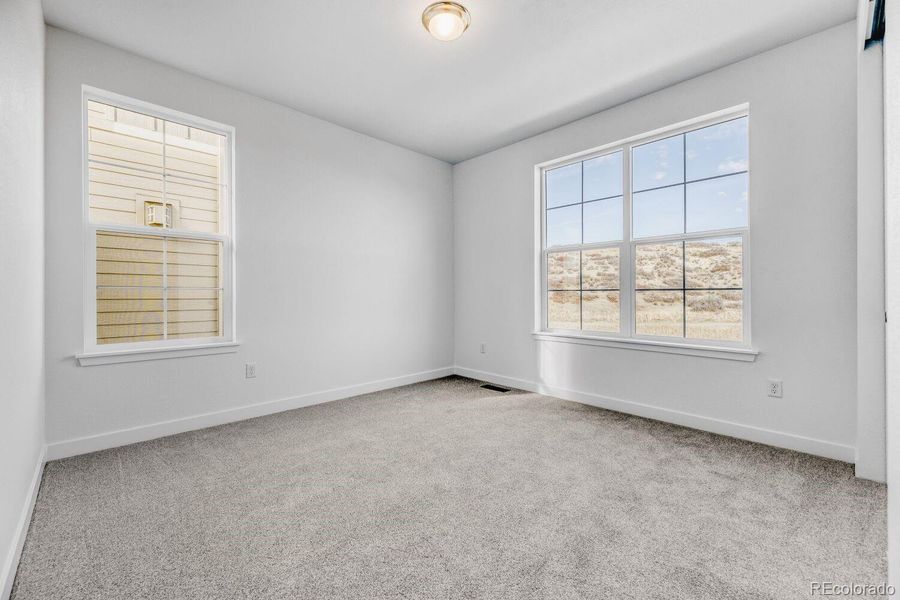 Spacious, unfurnished interior of a new home in Macanta: The Grand Collection, Castle Rock (Image 10).