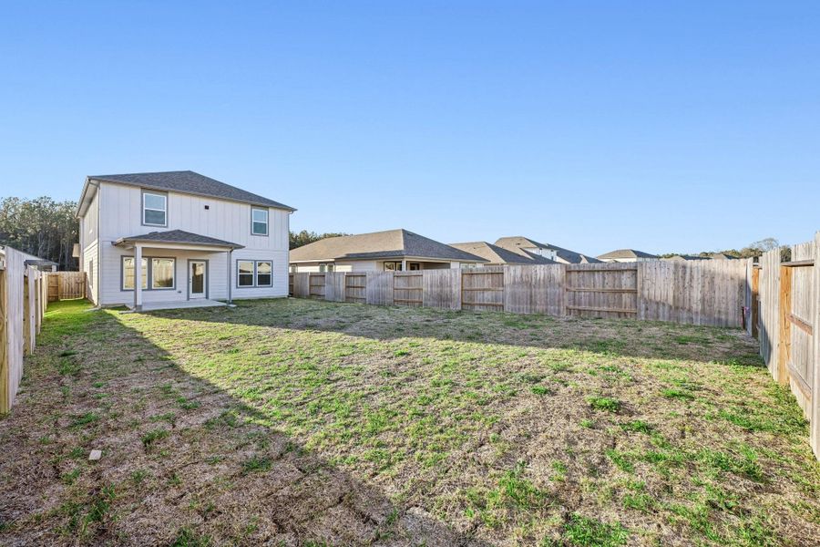 Exterior details and patio area of a home in Landing Meadows - Traditional Series, New Caney (Image 24). Exterior details and patio area of a home in Landing Meadows - Traditional Series, New Caney (Image 24).