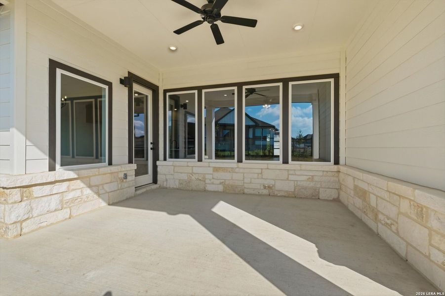 Exterior details and patio area of a home in The Crossvine, Schertz (Image 3).