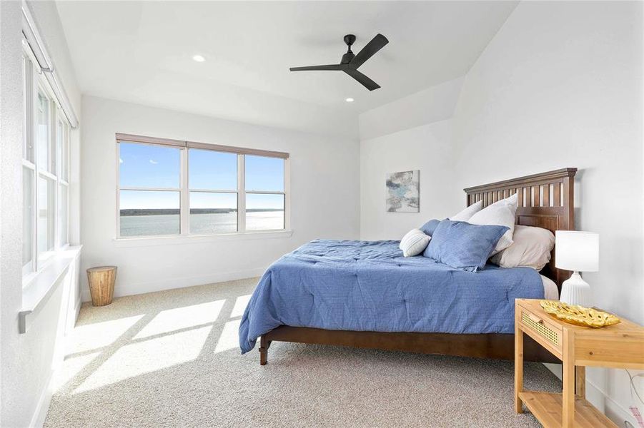 Bedroom with carpet flooring, ceiling fan, and recessed lighting
