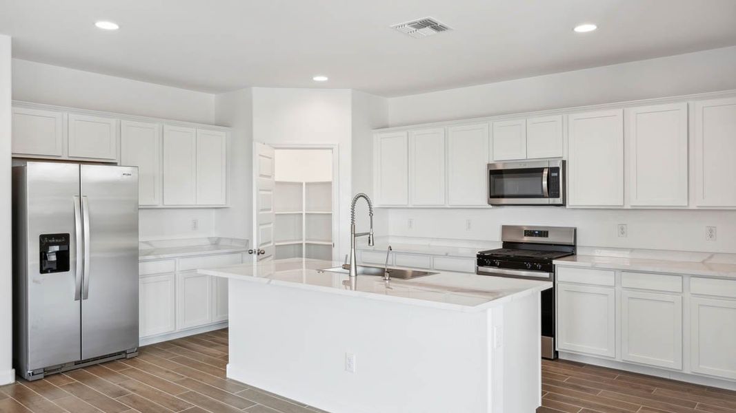 Furnished interior view inside a new home in Magma Ranch Vistas, Florence (Image 5).