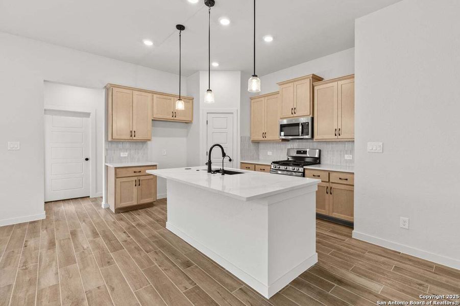 Furnished interior view inside a new home in Stream Waters, Seguin (Image 10).