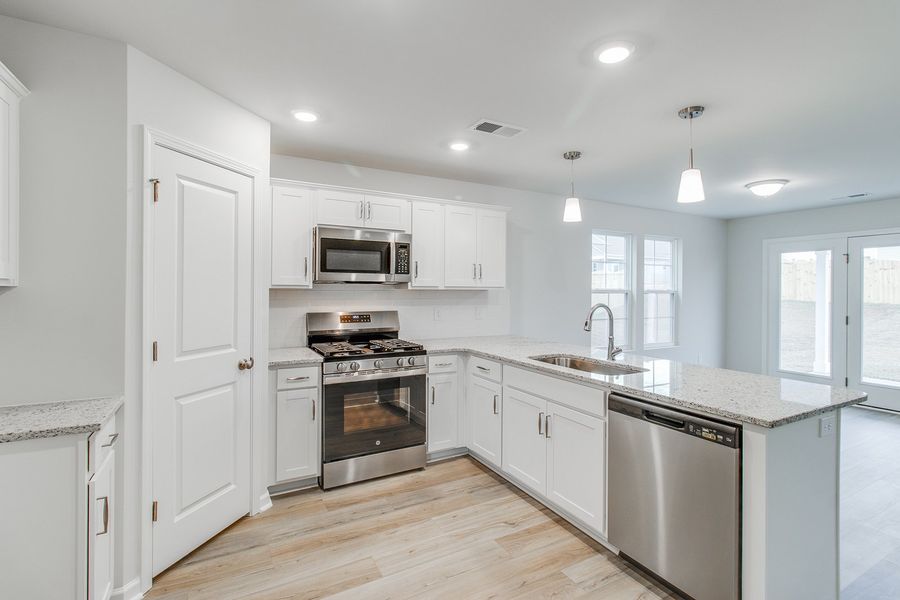 Furnished interior view inside a new home in Winston Point, Gilbert (Image 6). Furnished interior view inside a new home in Winston Point, Gilbert (Image 6).