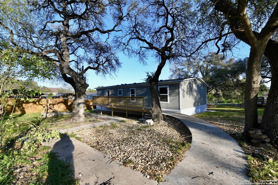 Front exterior of a new home in , San Antonio, TX, highlighting curb appeal (Image 21).