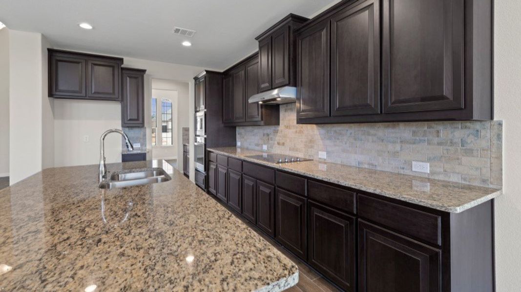 Representative furnished interior of a home built from the Valley Spring by D.R. Horton in Eden Ranch, Arlington (Image 9).