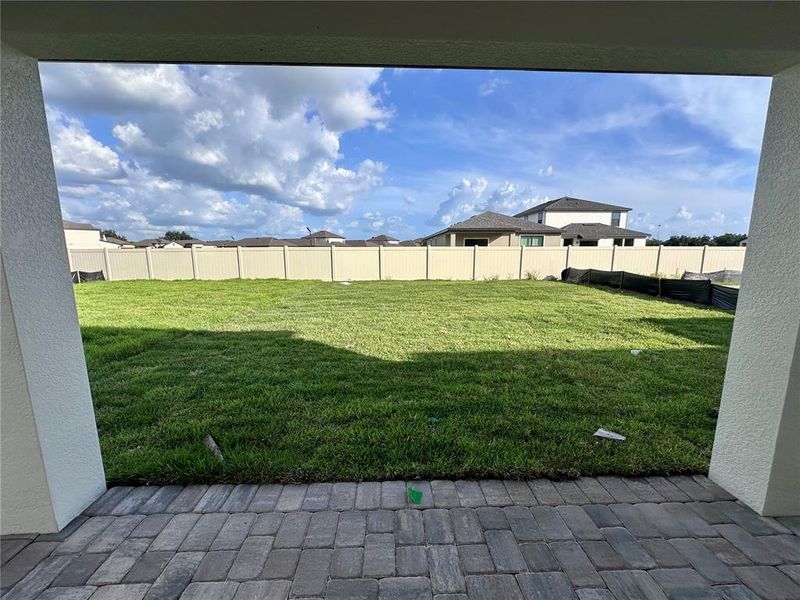 Front exterior of a new home in Grasslands West, Lakeland, FL, highlighting curb appeal (Image 23).
