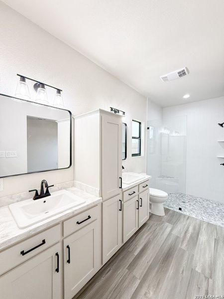 Furnished interior view inside a new home in , Devine (Image 10).