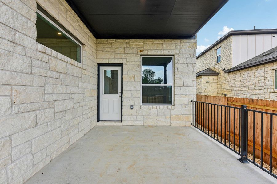 Exterior details and patio area of a home in Persimmon, Buda (Image 3). Exterior details and patio area of a home in Persimmon, Buda (Image 3).