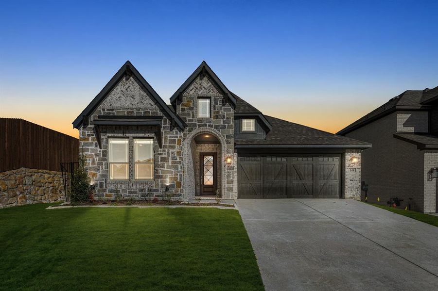 Front exterior of a new home in The Lakes at Parks of Aledo, Aledo, TX, highlighting curb appeal (Image 2).