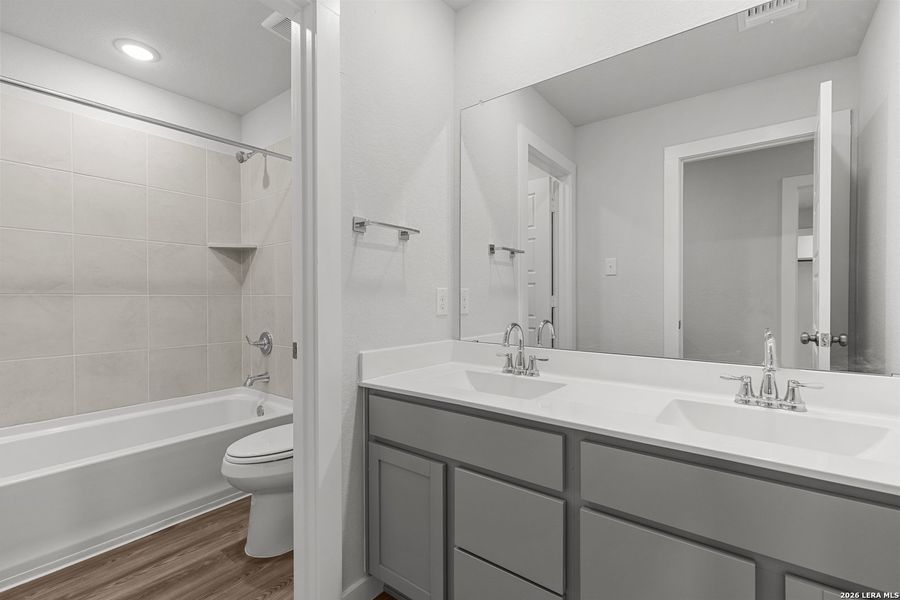 Furnished interior view inside a new home in Hacienda, San Antonio (Image 7).