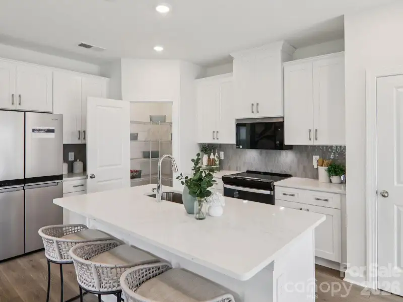 Photo is not of the actual home, but is an inspirational photo of builder’s model home and may depict options, furnishings, and/or decorator features that are not included Photo is not of the actual home, but is an inspirational photo of builder’s model home and may depict options, furnishings, and/or decorator features that are not included