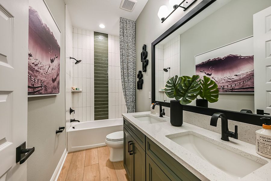Representative furnished interior of a home built from the Key Largo II by Homes by WestBay in Barrington Preserve, Brandon (Image 26).