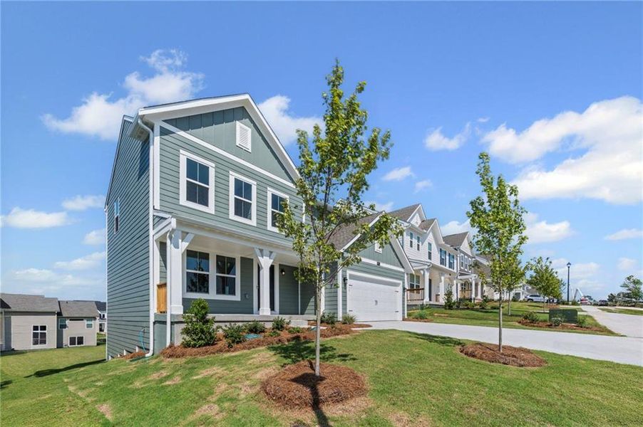 Front exterior of a new home in Twin Lakes, Braselton, GA, highlighting curb appeal (Image 19).