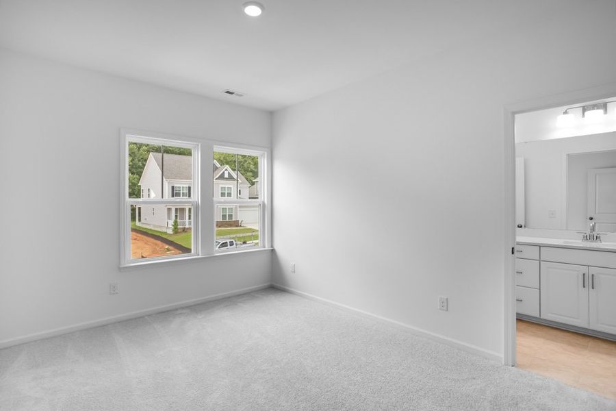 Representative unfurnished interior of a home built from the Leland by Taylor Morrison in Stafford at Langtree, Mooresville (Image 21).