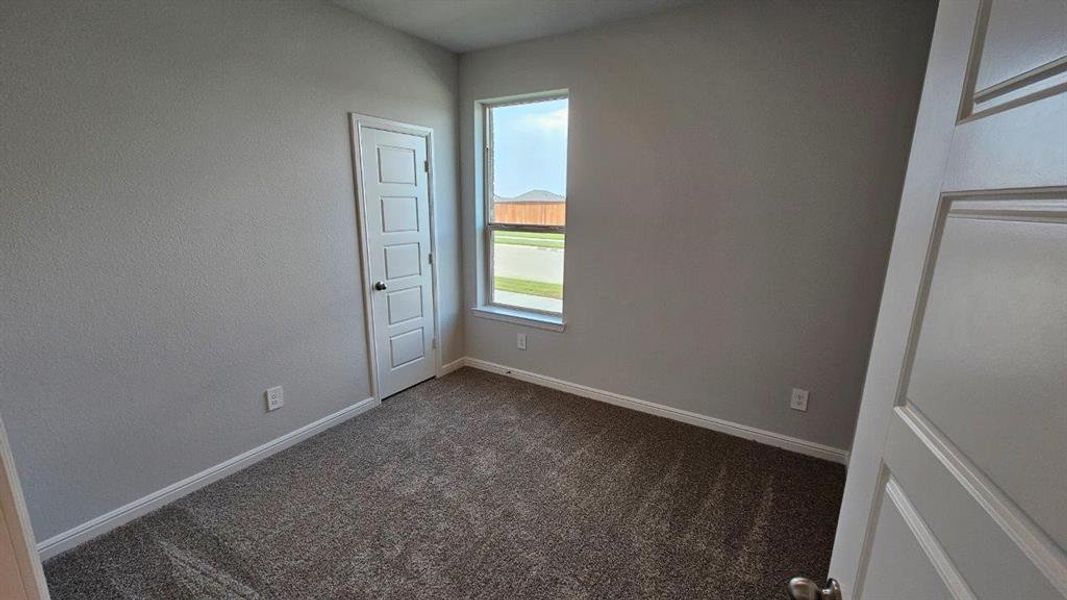 Spacious, unfurnished interior of a new home in Monarch at the Meadows, Ponder (Image 9).