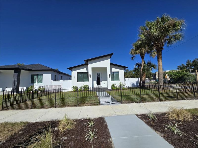 Front exterior of a new home in , St. Petersburg, FL, highlighting curb appeal (Image 2). Front exterior of a new home in , St. Petersburg, FL, highlighting curb appeal (Image 2).