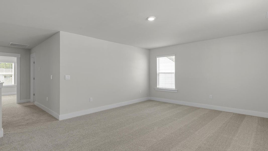 Spacious, unfurnished interior of a new home in Surfside Landing, Hubert (Image 32).