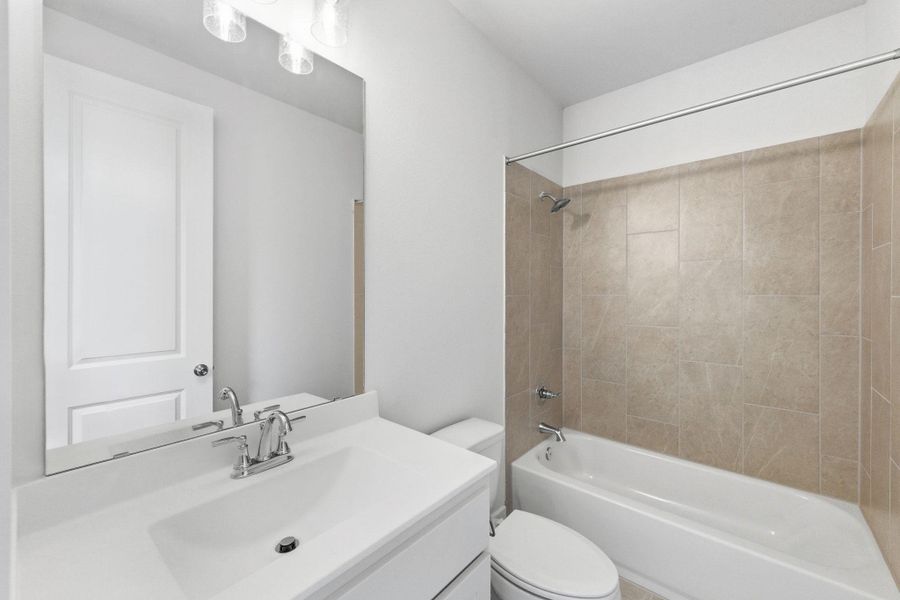 Furnished interior view inside a new home in The Colony, Bastrop (Image 7).