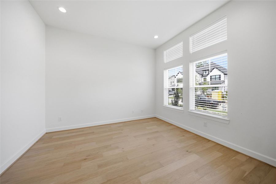 Dedicated home office with large windows and flexible functionality