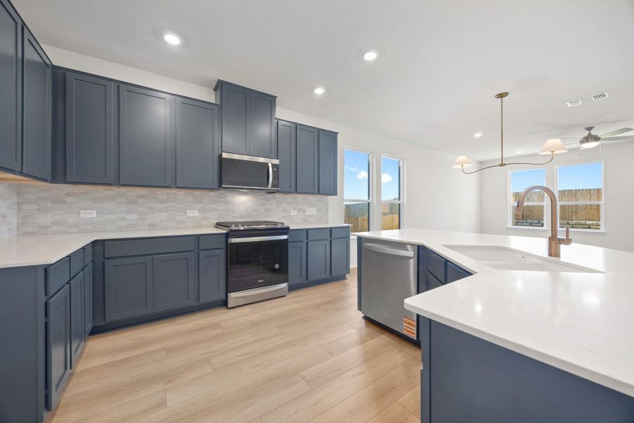 Furnished interior view inside a new home in Salerno - Classic Collection, Round Rock (Image 11). Furnished interior view inside a new home in Salerno - Classic Collection, Round Rock (Image 11).