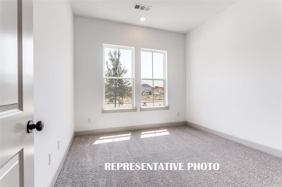 You'll find nicely sized secondary bedrooms in our Toulouse floor plan.  REPRESENTATIVE PHOTO