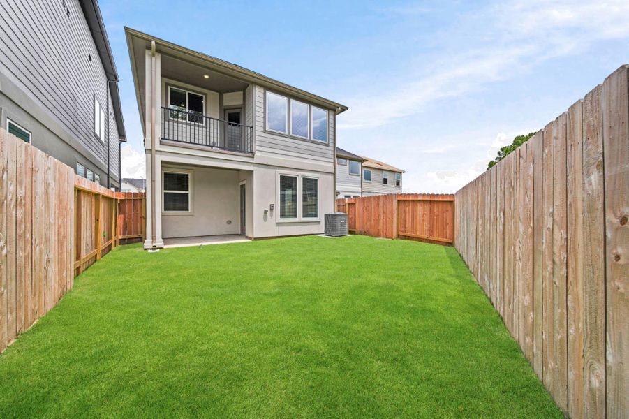 Exterior details and patio area of a home in Park Hill Villas, Stafford (Image 16).
