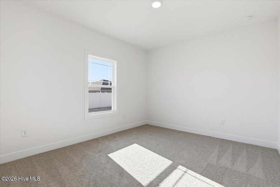 Spacious, unfurnished interior of a new home in Wood Creek Landing, Leland (Image 20). Spacious, unfurnished interior of a new home in Wood Creek Landing, Leland (Image 20).