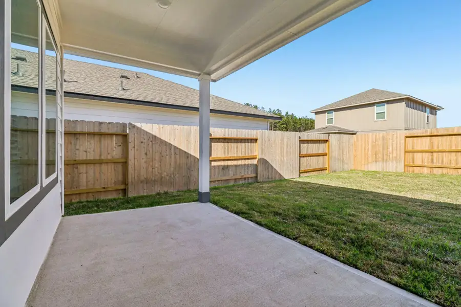 Exterior details and patio area of a home in Landing Meadows - Traditional Series, New Caney (Image 1). Exterior details and patio area of a home in Landing Meadows - Traditional Series, New Caney (Image 1).