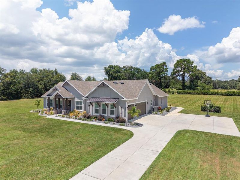 Front exterior of a new home in , Oxford, FL, highlighting curb appeal (Image 23).