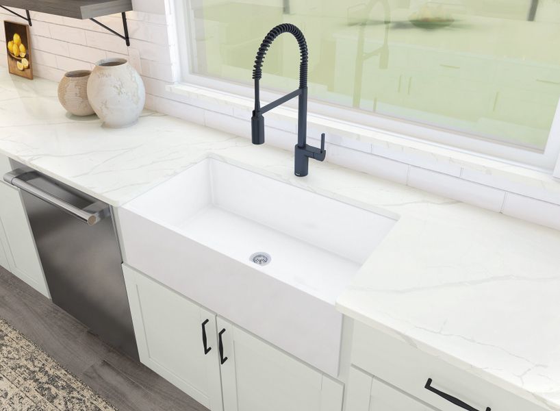 Kitchen with apron-front sink