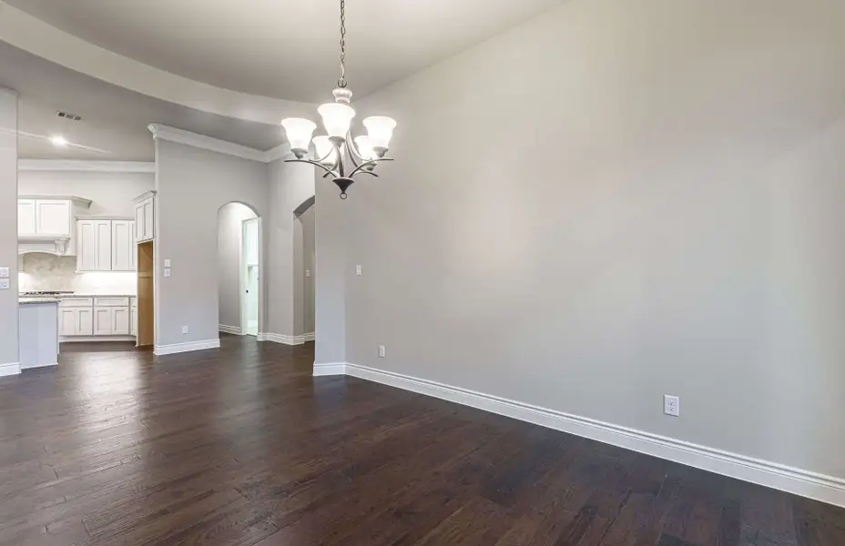 Representative unfurnished interior of a home built from the 3616 by Ravenna Homes in Artavia 70′, Conroe (Image 31).