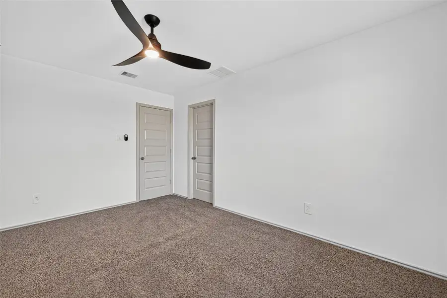 Bedroom #3 also features a walk-in closet.