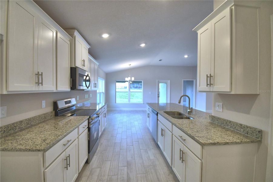 Furnished interior view inside a new home in Lake Juliana Estates, Auburndale (Image 8).