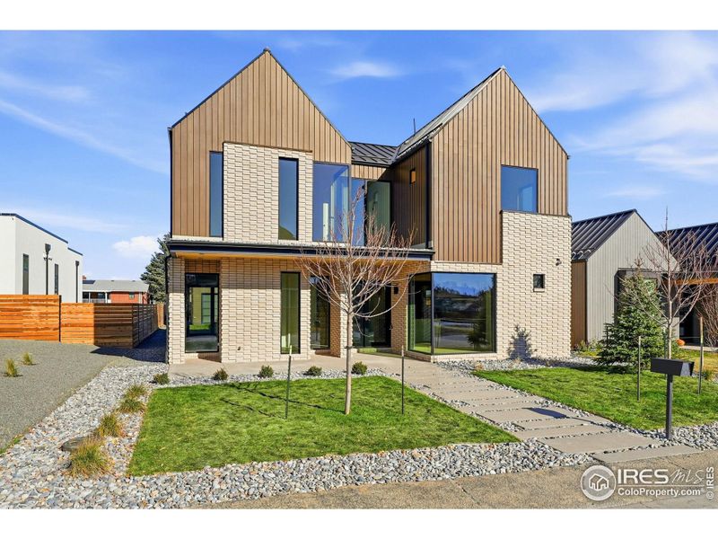 Front exterior of a new home in , Superior, CO, highlighting curb appeal (Image 26).