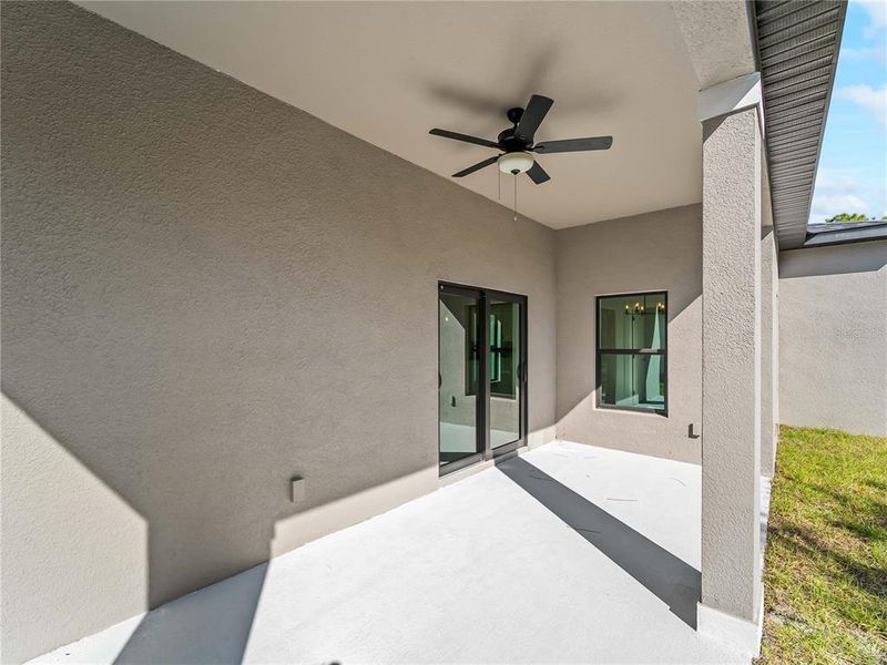 Exterior details and patio area of a home in , North Port (Image 34).